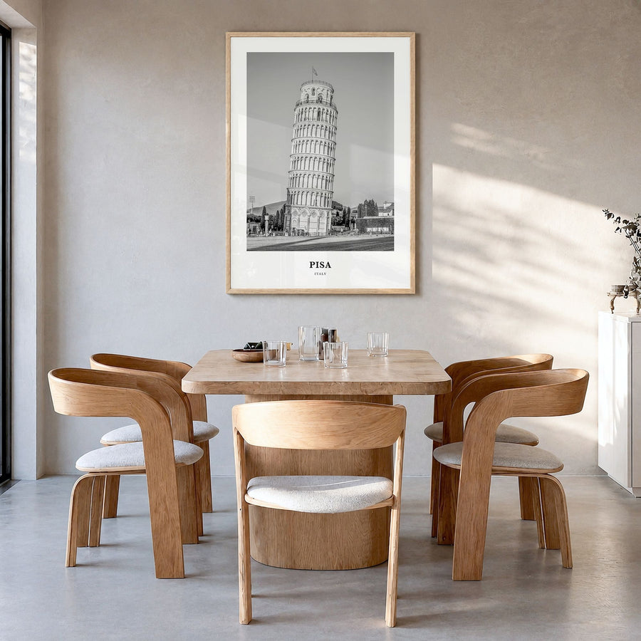 Pisa Classic Poster in a natural wood frame, hanging in a dining room