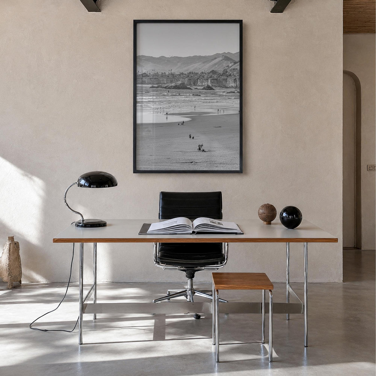Pismo Beach no. 1 black & white photo poster of California, USA – vertical wall art in black wood frame, hanging on wall