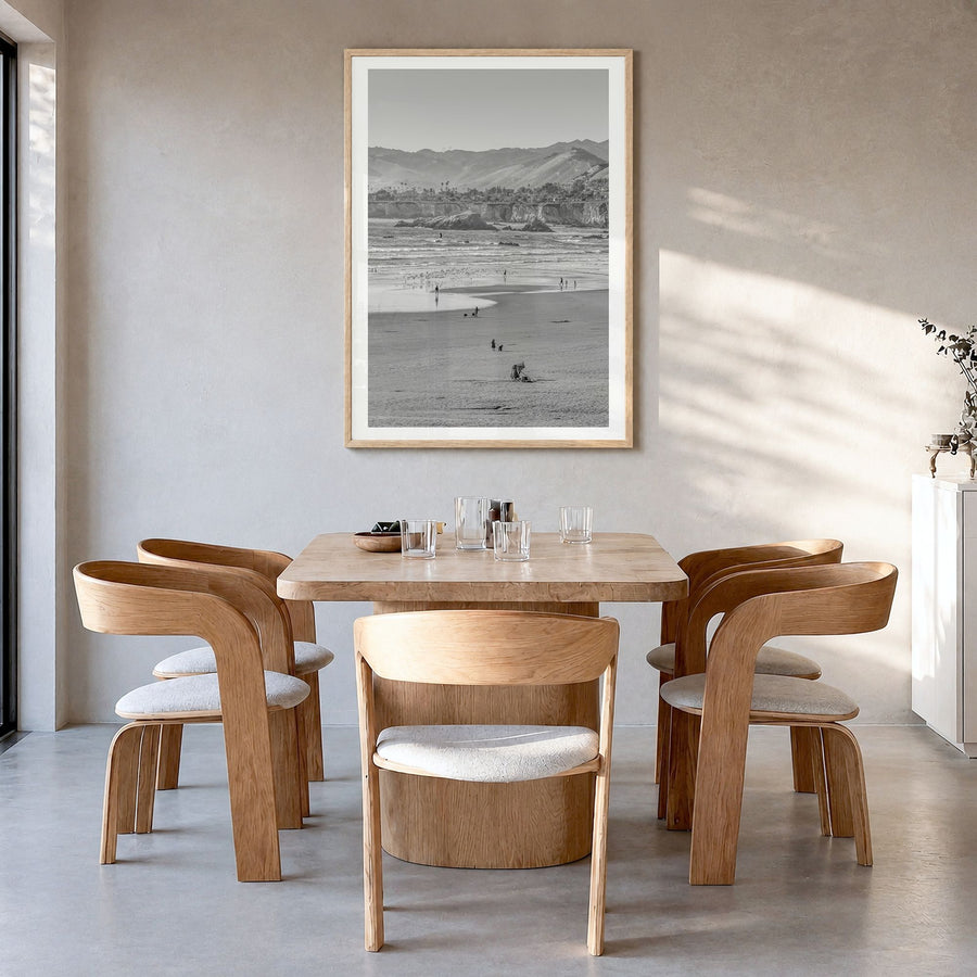 Pismo Beach Photo No 2 Poster in a natural wood frame, hanging in a dining room, white border
