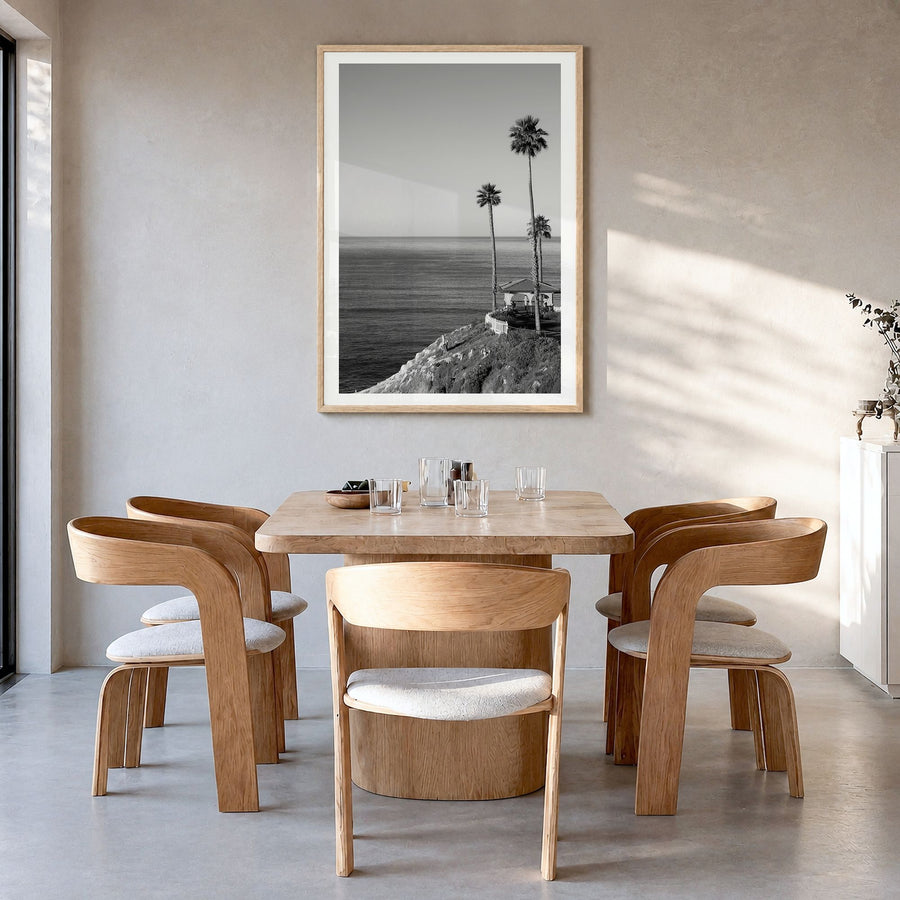 Pismo Beach Photo No 1 Poster in a natural wood frame, hanging in a dining room, white border