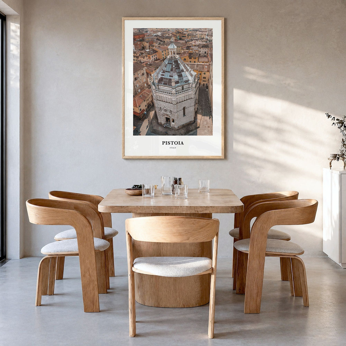 Pistoia Classic Poster in a natural wood frame, hanging in a dining room