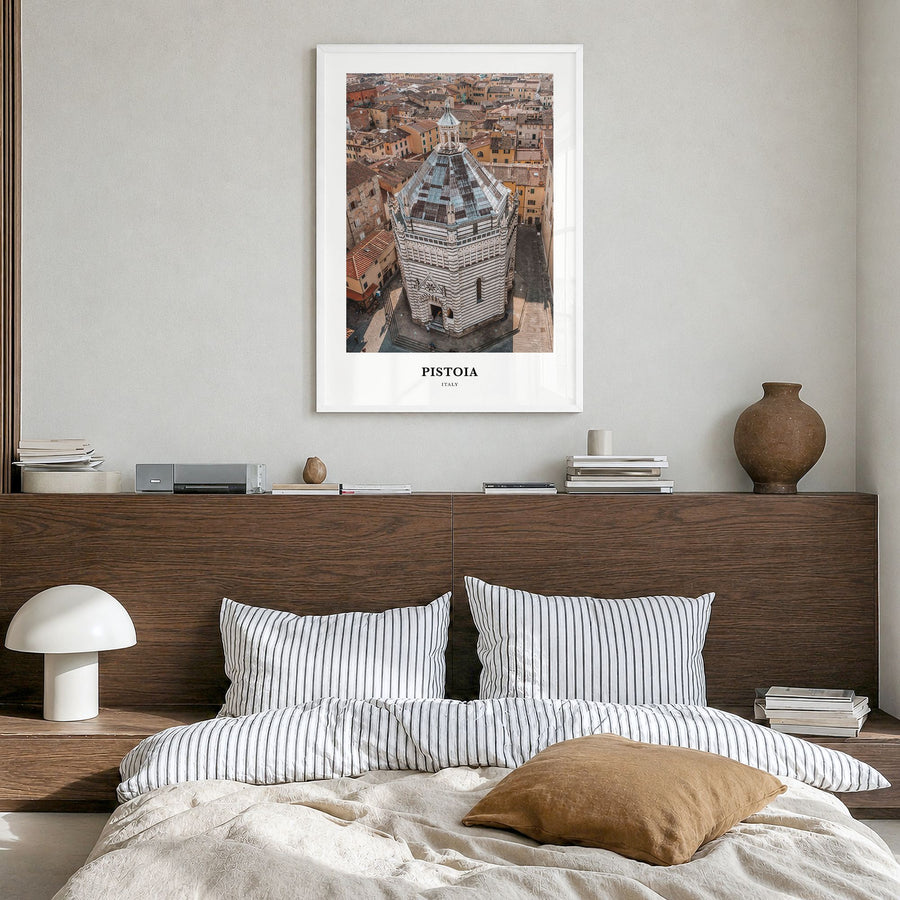 Pistoia Classic Poster in a white wood frame, hanging in a bedroom