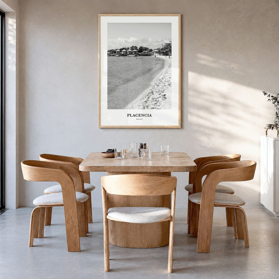 Placencia Classic Poster in a natural wood frame, hanging in a dining room