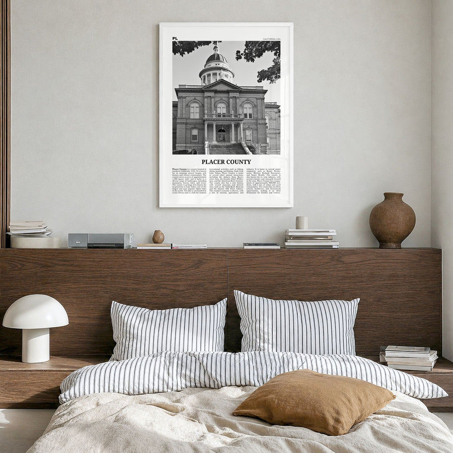 Placer County Newspaper Poster in a white wood frame, hanging in a bedroom