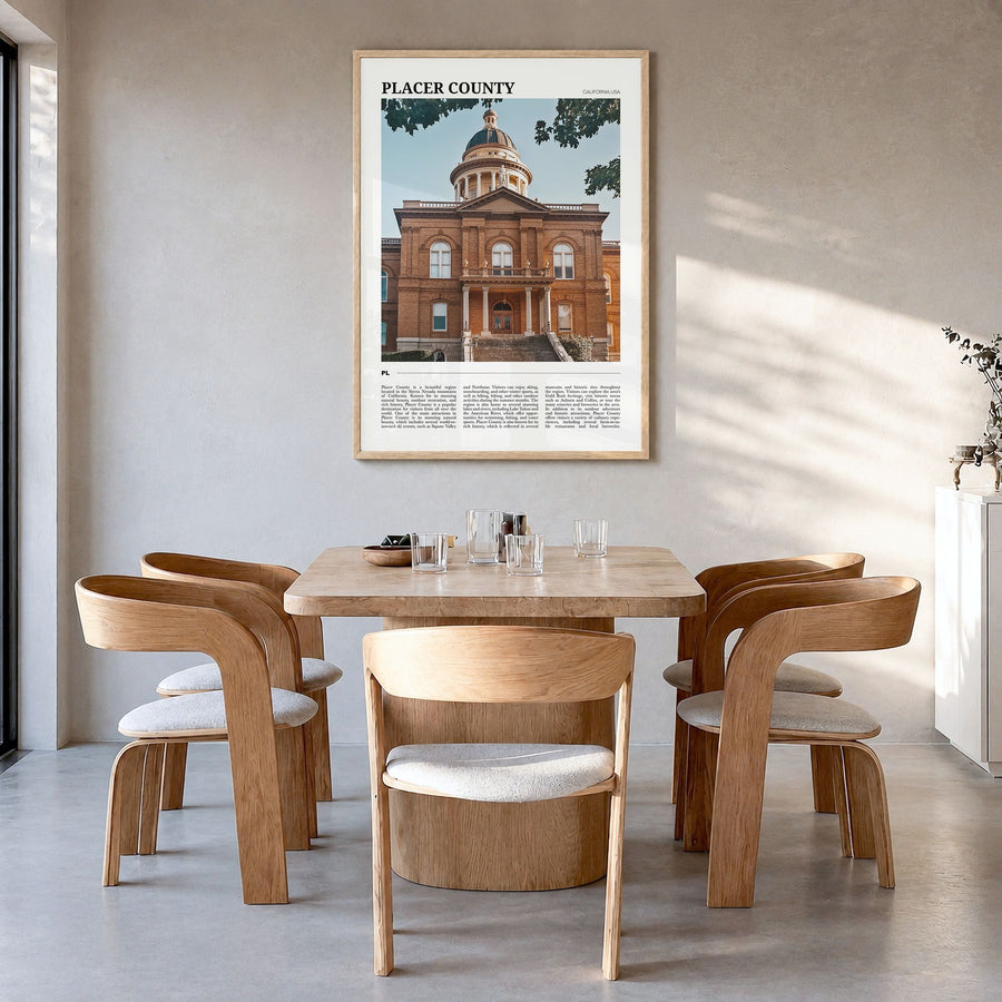 Placer County Travel Poster in a natural wood frame, hanging in a dining room