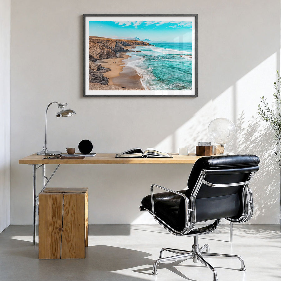Playa del Rey Photo Poster in a black wood frame, hanging in a bright home office, white border