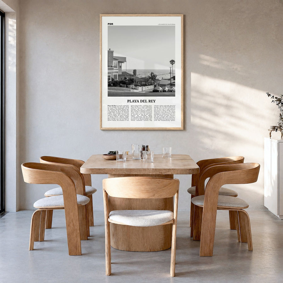 Playa del Rey Newspaper Poster in a natural wood frame, hanging in a dining room