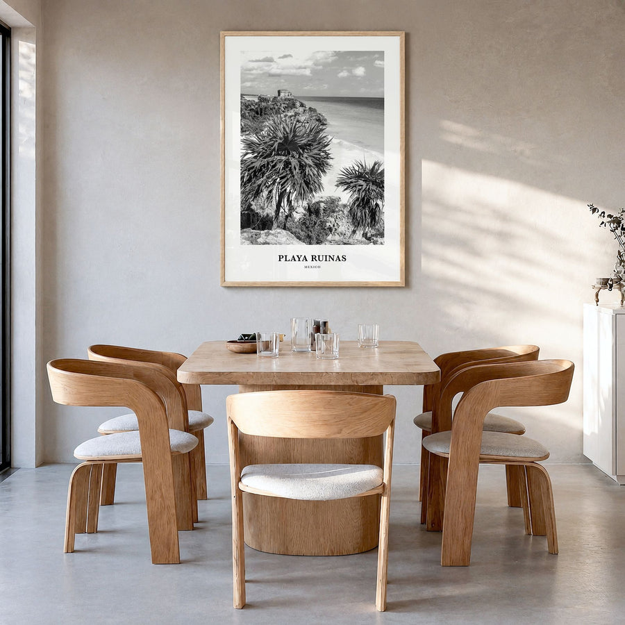 Playa Ruinas Classic Poster in a natural wood frame, hanging in a dining room