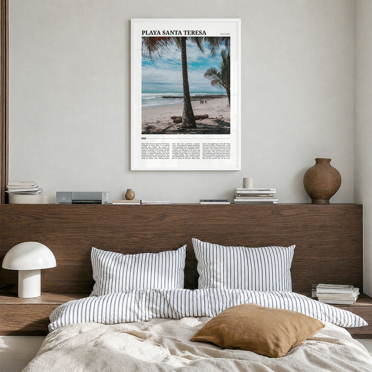 Playa Santa Teresa Travel Poster in a white wood frame, hanging in a bedroom