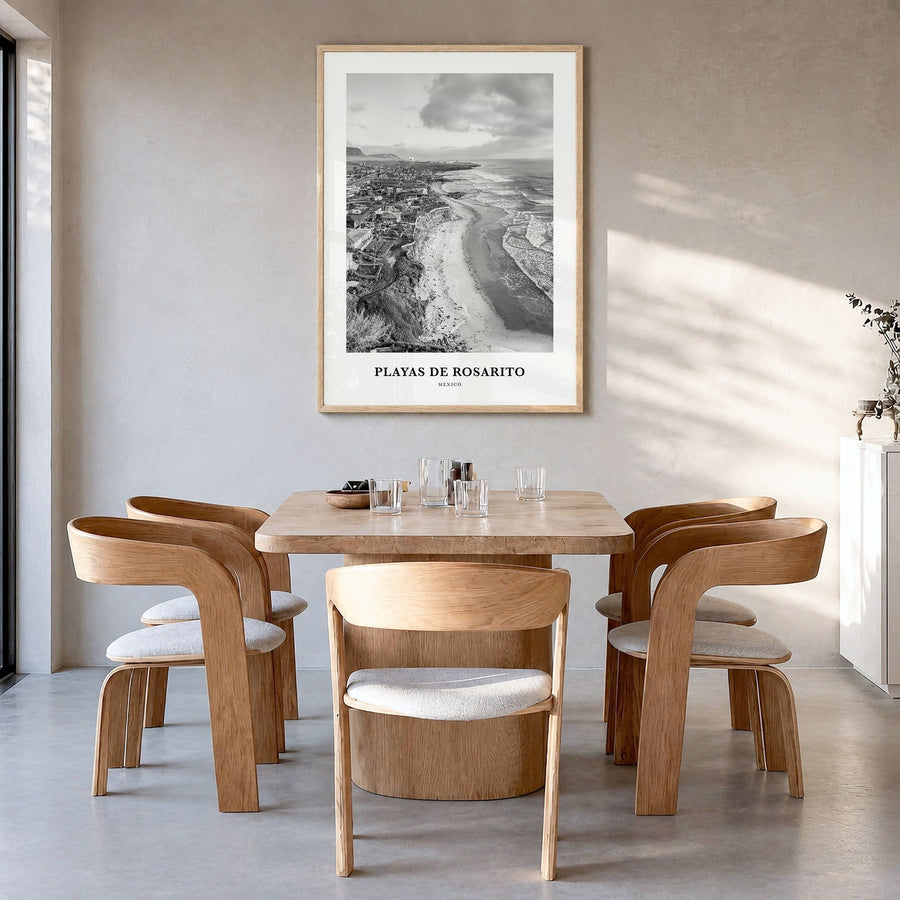 Playas de Rosarito Classic Poster in a natural wood frame, hanging in a dining room