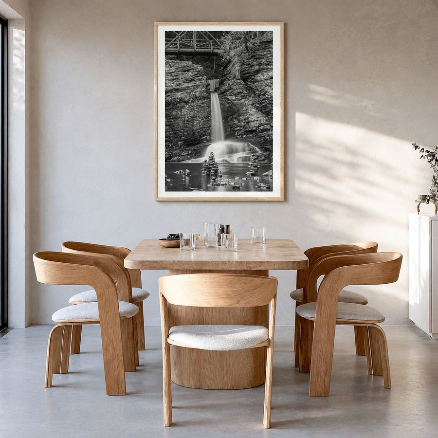 Pocono Mountains Photo Poster in a natural wood frame, hanging in a dining room, white border