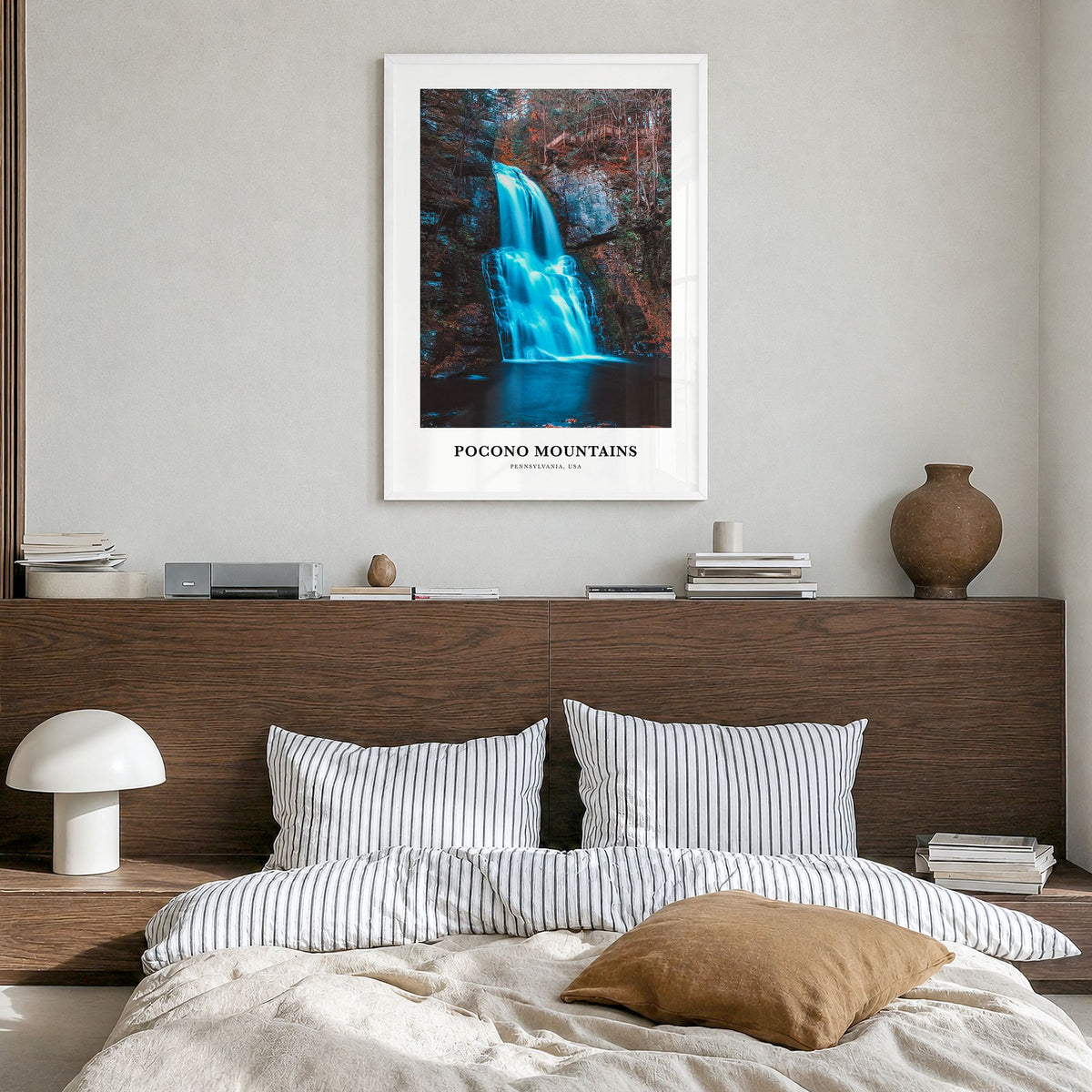 Pocono Mountains Classic No 1 Poster in a white wood frame, hanging in a bedroom
