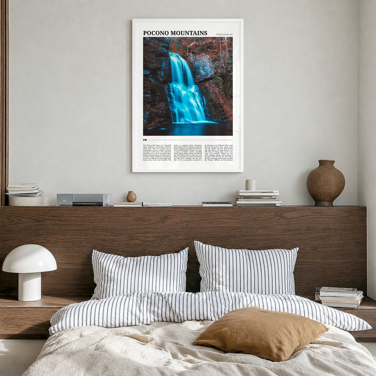 Pocono Mountains Travel No 1 Poster in a white wood frame, hanging in a bedroom