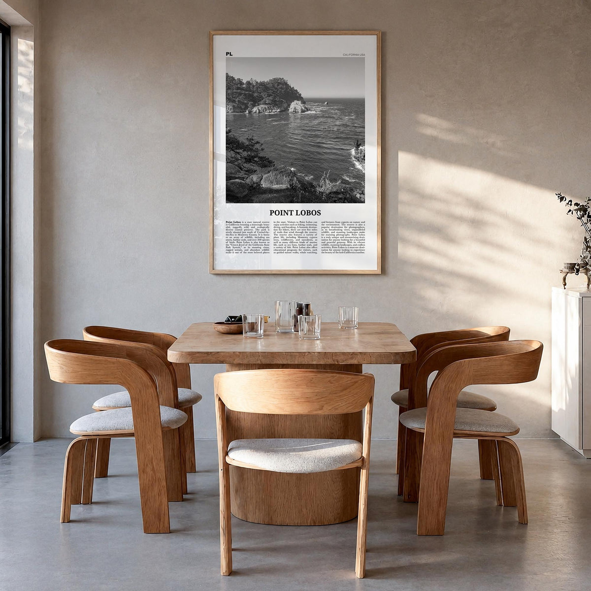 Point Lobos black & white newspaper poster of California, USA – vertical wall art in natural wood frame, hanging on wall