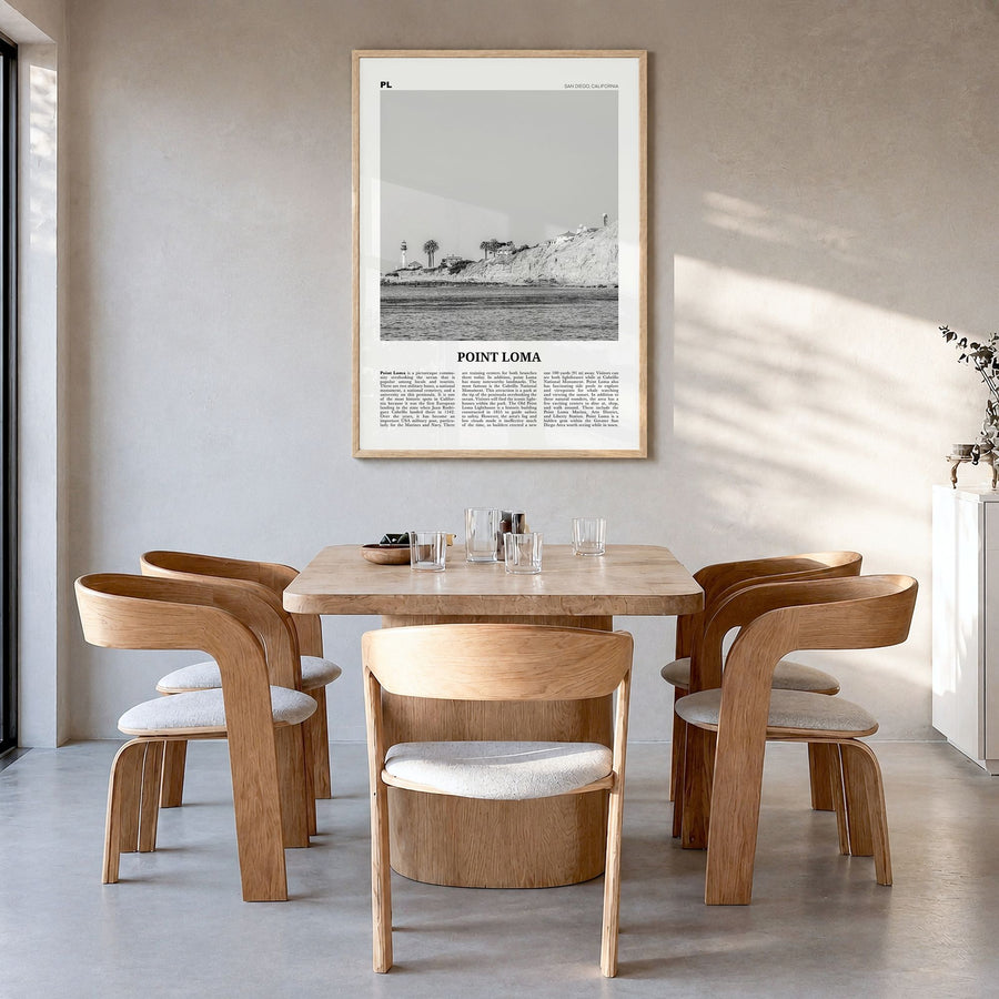 Point Loma Newspaper Poster in a natural wood frame, hanging in a dining room