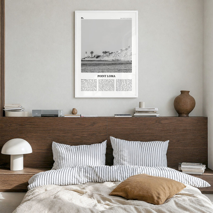 Point Loma Newspaper Poster in a white wood frame, hanging in a bedroom