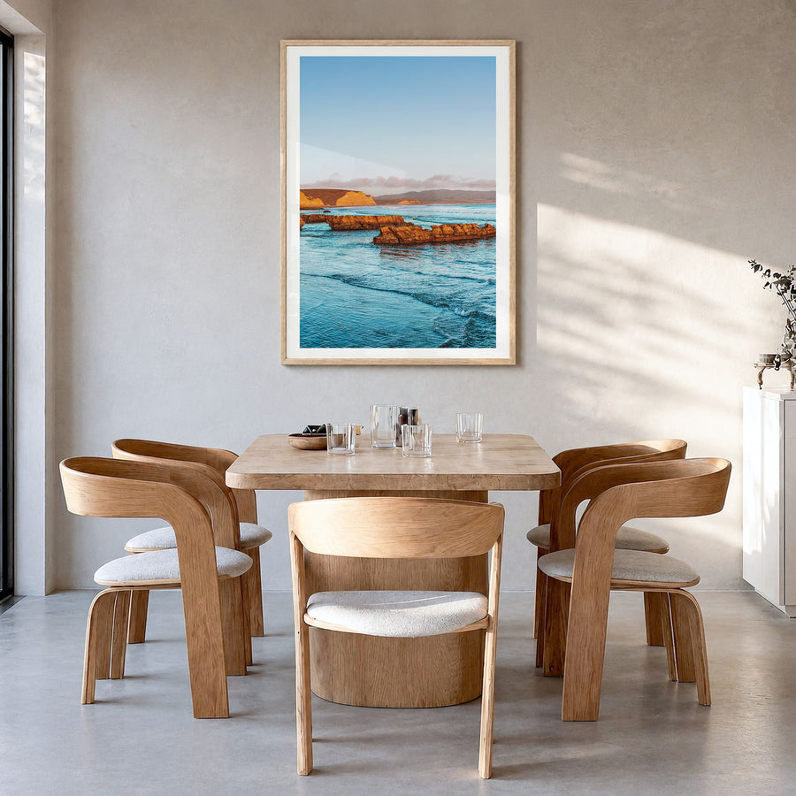 Point Reyes Photo No 1 Poster in a natural wood frame, hanging in a dining room, white border