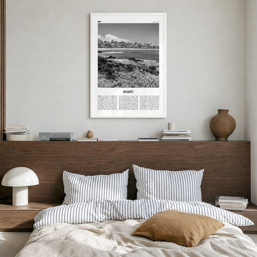 Poipu Newspaper Poster in a white wood frame, hanging in a bedroom