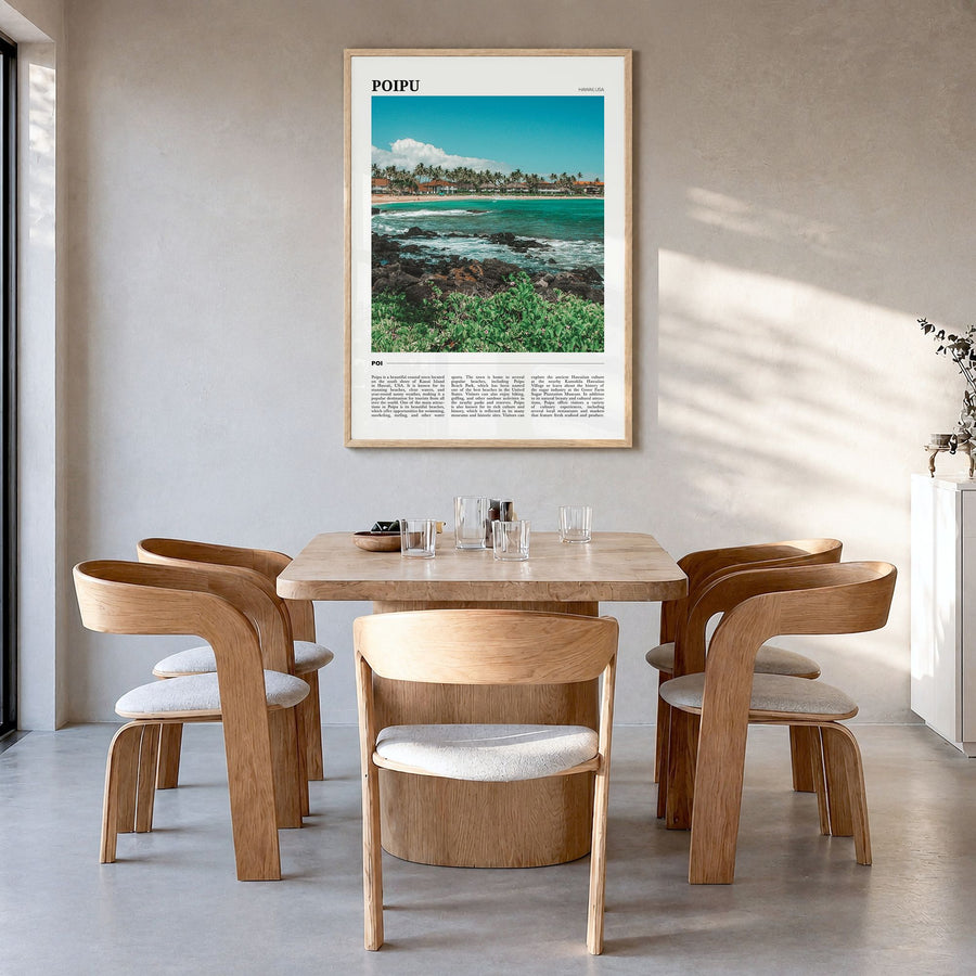 Poipu Travel Poster in a natural wood frame, hanging in a dining room