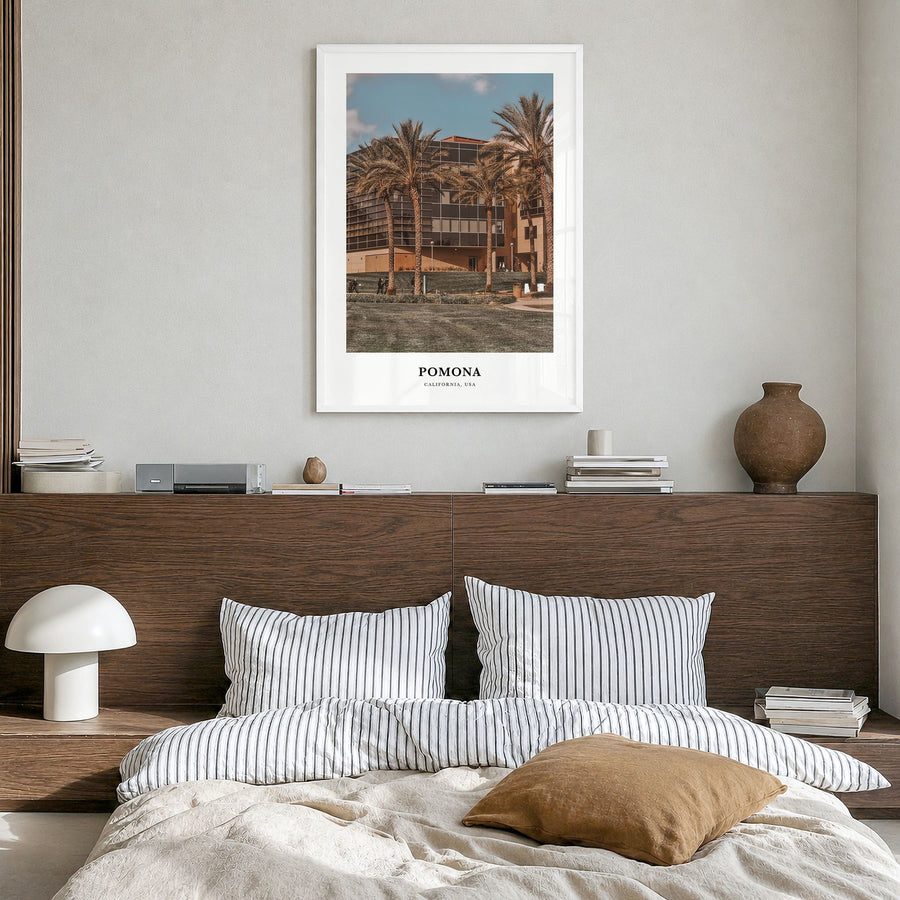Pomona Classic Poster in a white wood frame, hanging in a bedroom