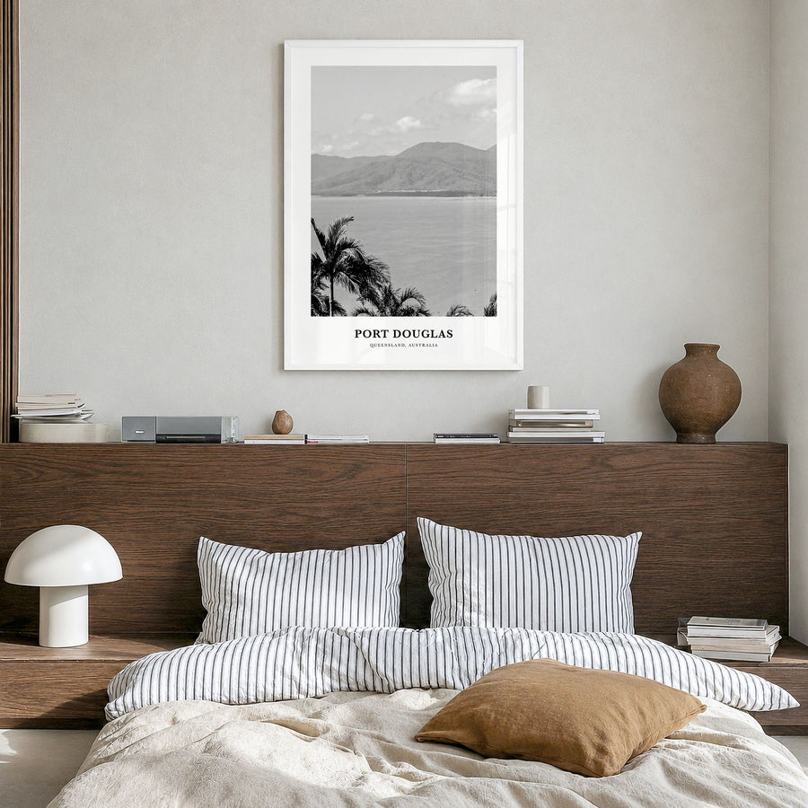 Port Douglas Classic Poster in a white wood frame, hanging in a bedroom