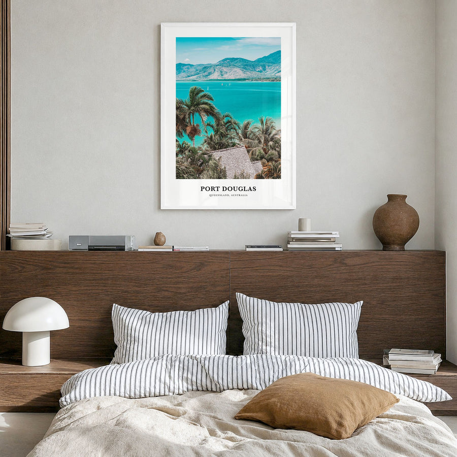 Port Douglas Classic Poster in a white wood frame, hanging in a bedroom