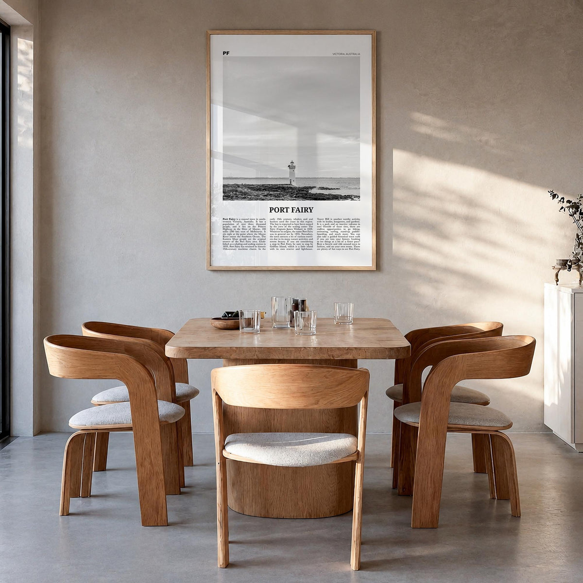 Port Fairy black & white newspaper poster of Victoria, Australia – vertical wall art in natural wood frame, hanging on wall