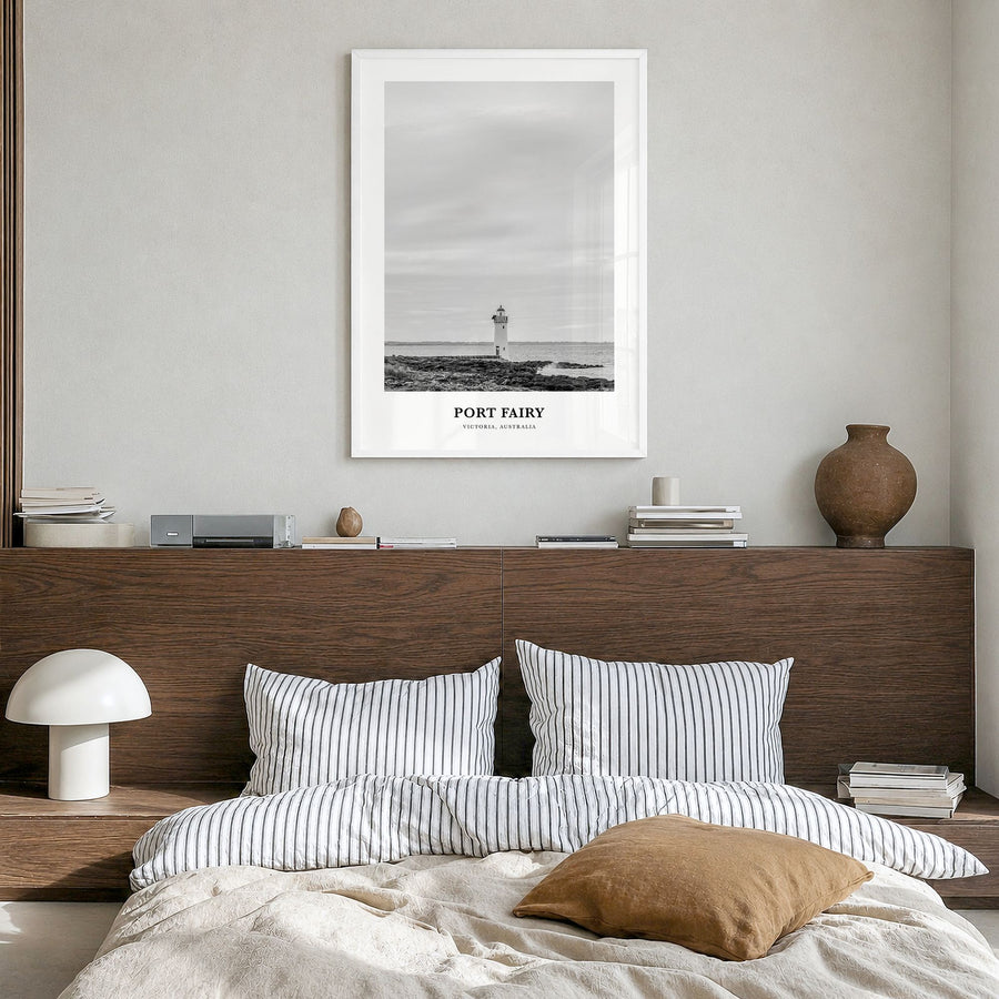 Port Fairy Classic Poster in a white wood frame, hanging in a bedroom