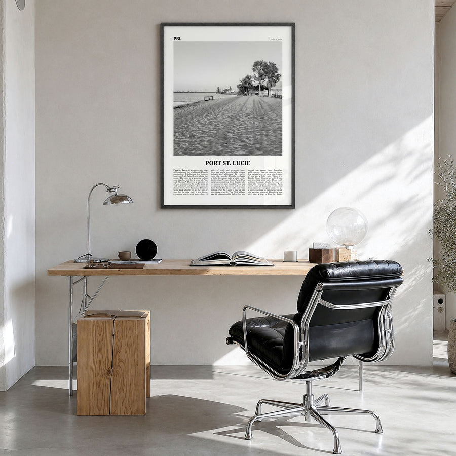 Port St. Lucie Newspaper Poster in a black wood frame, hanging in a bright home office