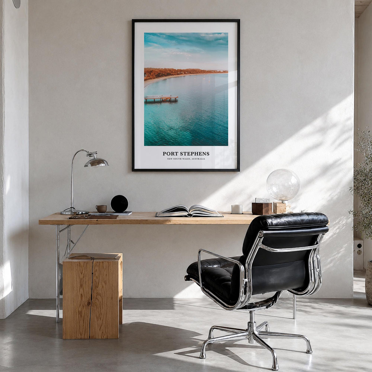 Port Stephens colorful classic poster of Australia – vertical wall art in black wood frame, hanging on wall