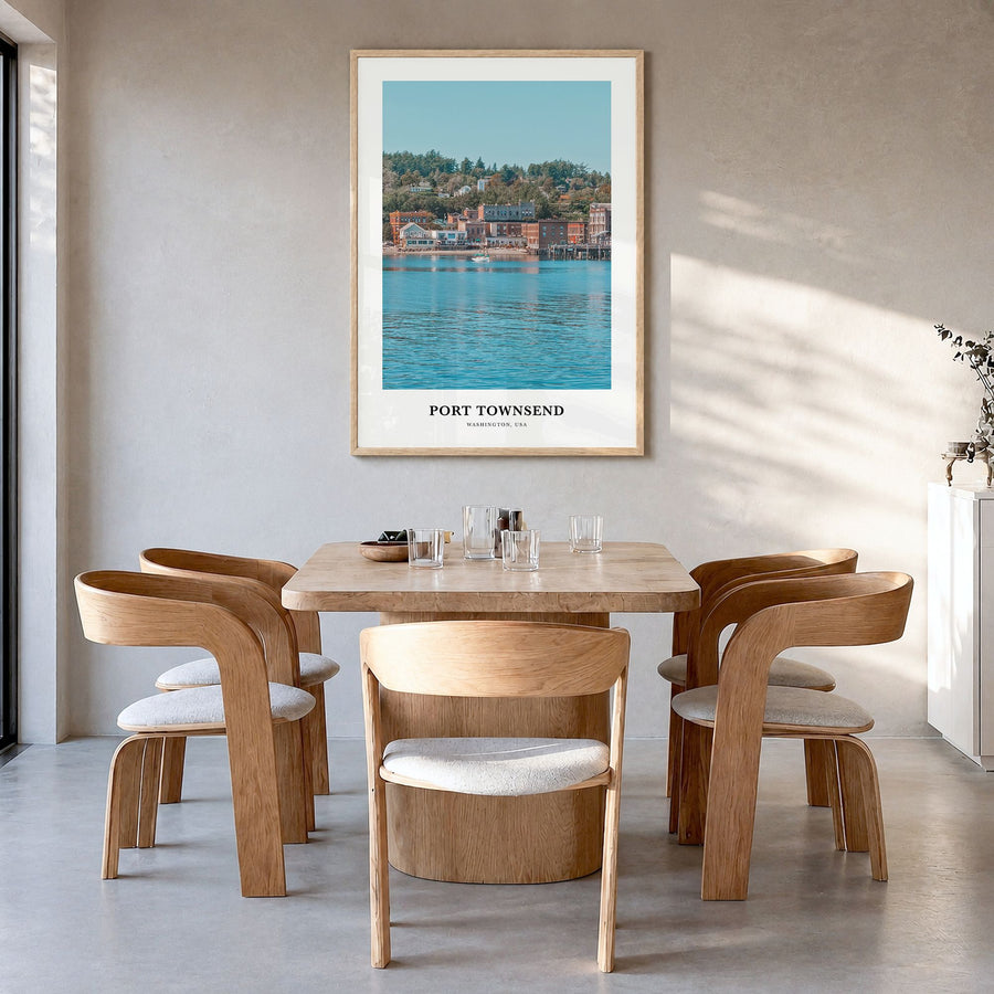 Port Townsend Classic Poster in a natural wood frame, hanging in a dining room