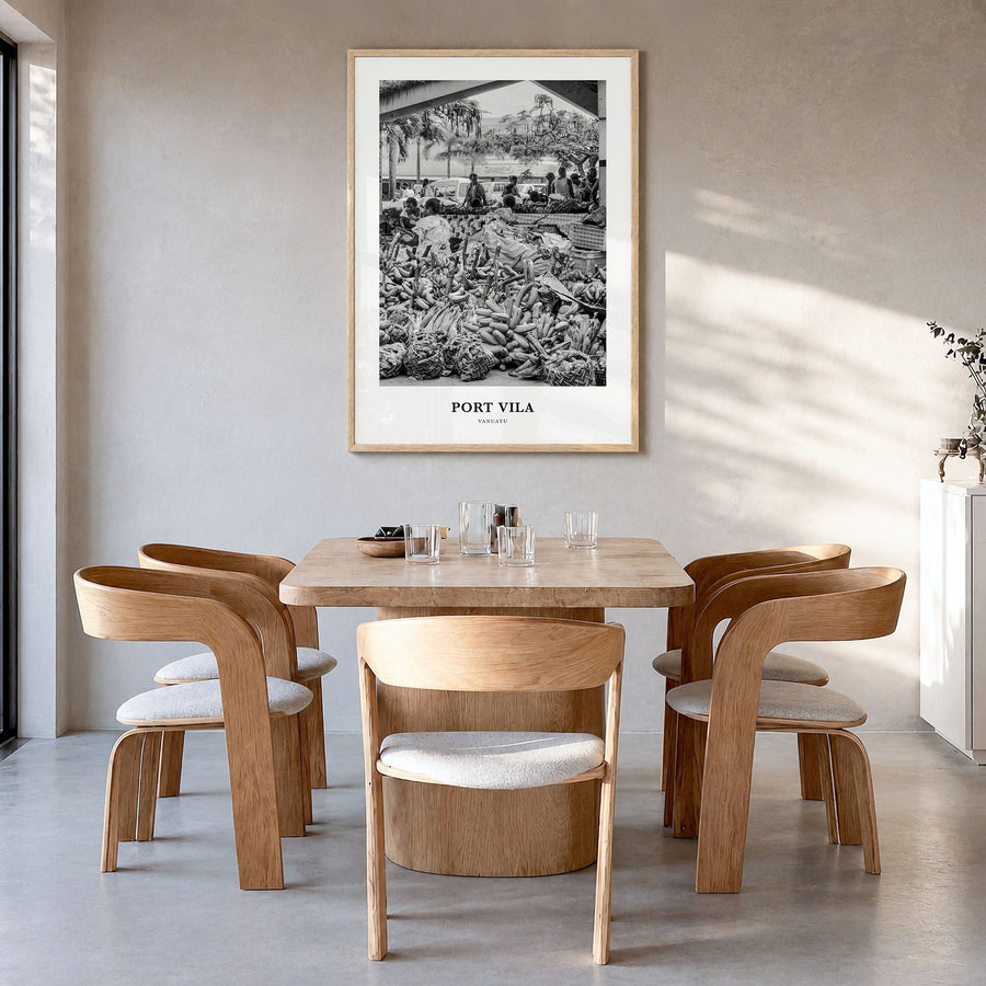 Port Vila Classic Poster in a natural wood frame, hanging in a dining room