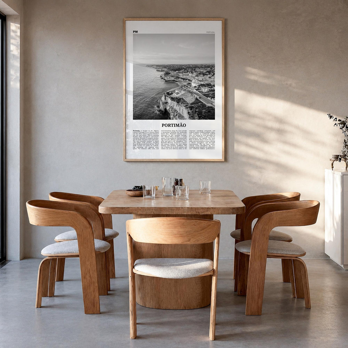 Portimão black & white newspaper poster of Portugal – vertical wall art in natural wood frame, hanging on wall
