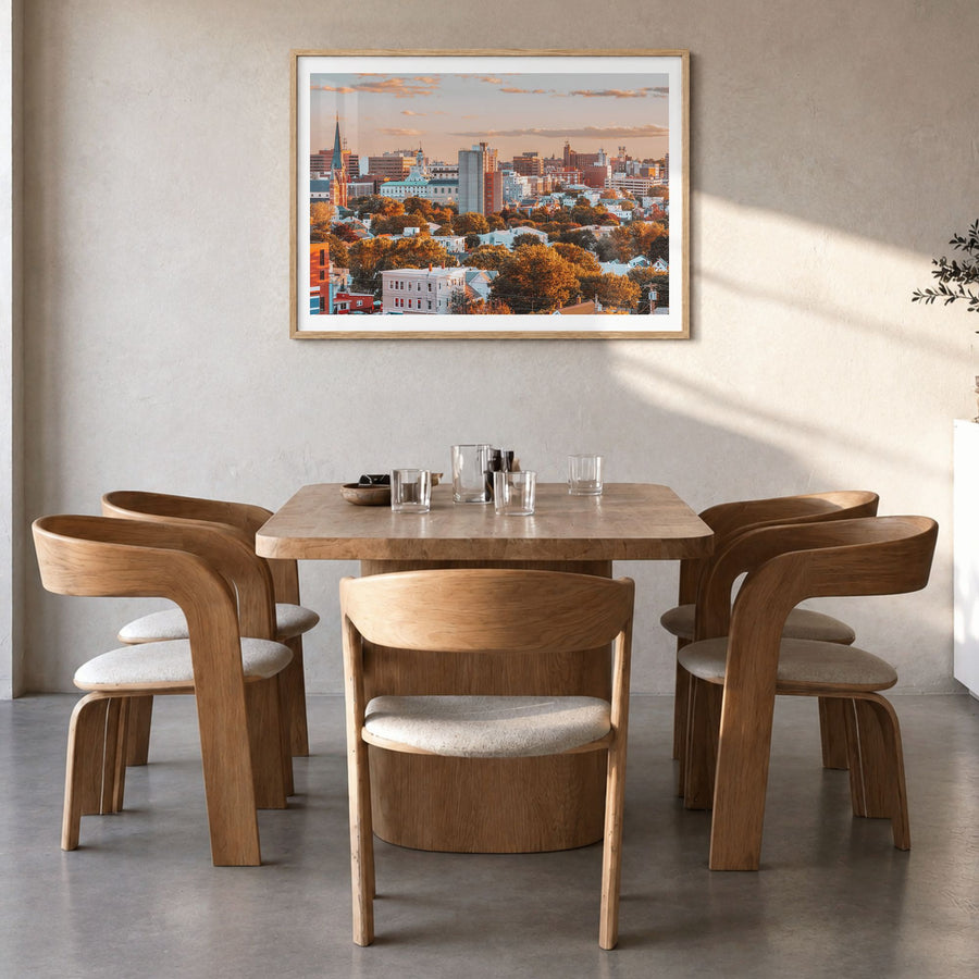 Portland, Maine Photo Poster in a natural wood frame, hanging in a dining room, white border