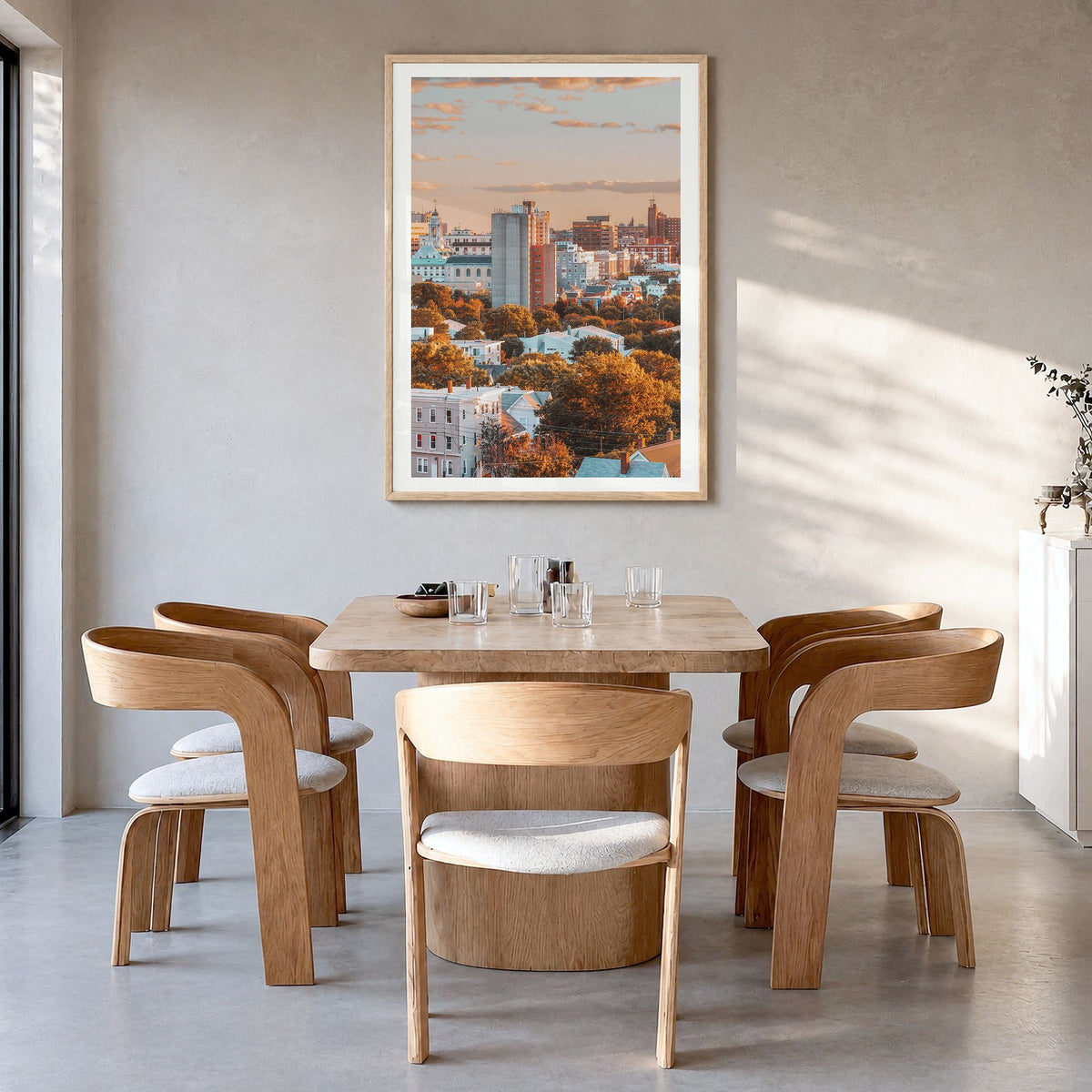 Portland, Maine Photo No 1 Poster in a natural wood frame, hanging in a dining room, white border
