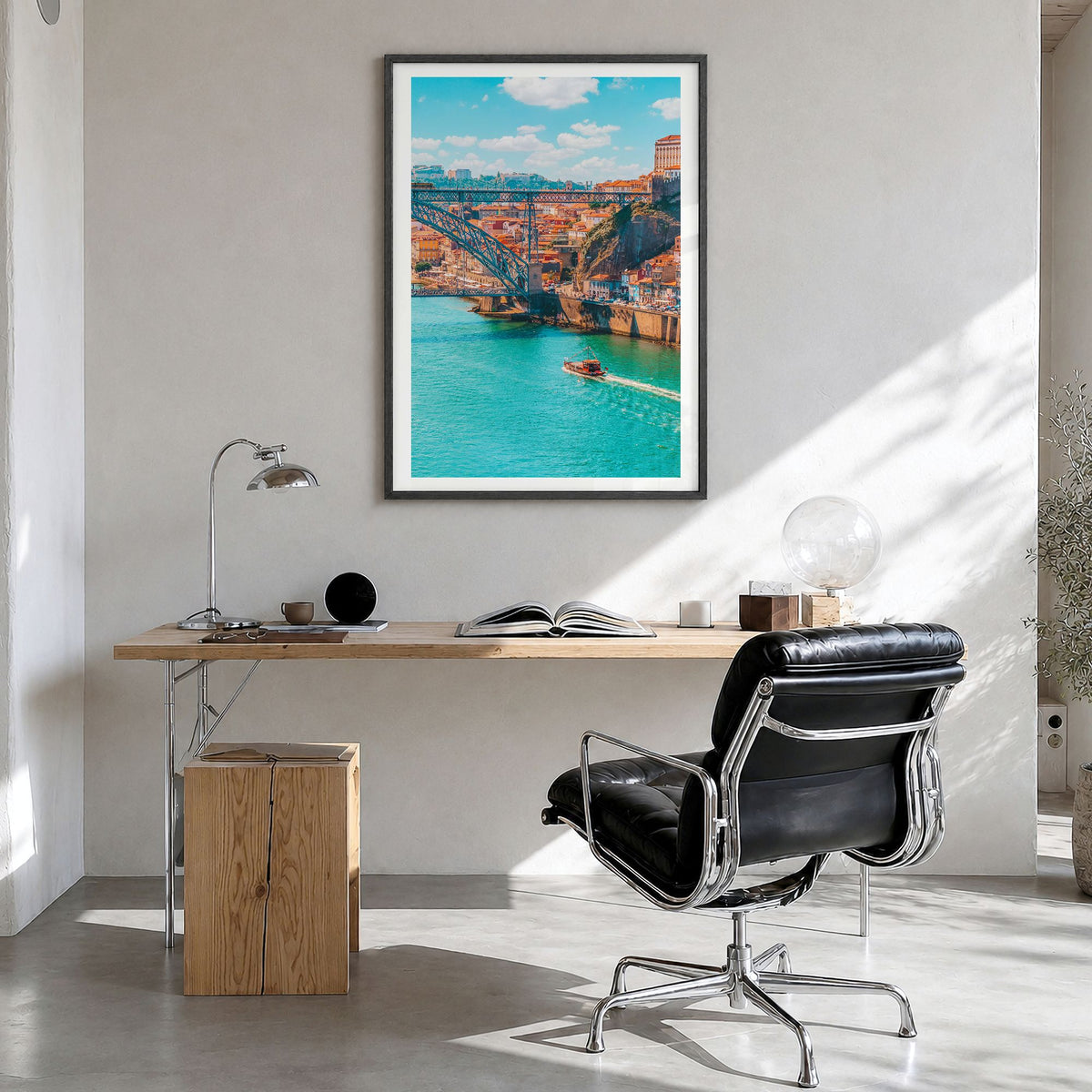 Porto Photo Poster in a black wood frame, hanging in a bright home office, white border