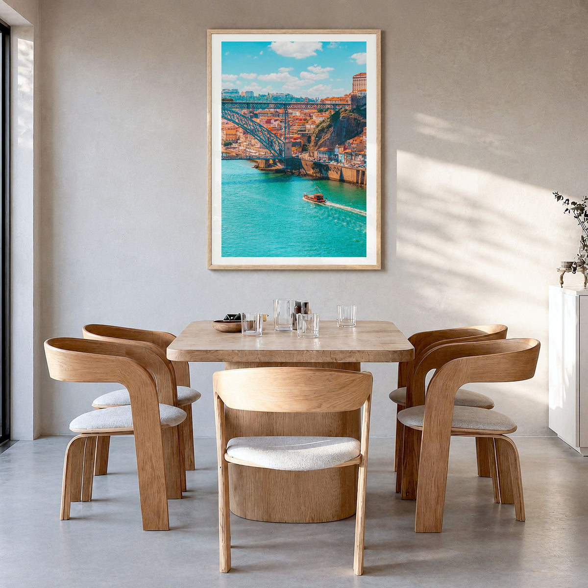 Porto Photo Poster in a natural wood frame, hanging in a dining room, white border