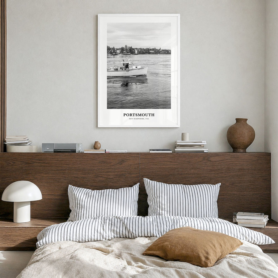 Portsmouth, New Hampshire Classic Poster in a white wood frame, hanging in a bedroom