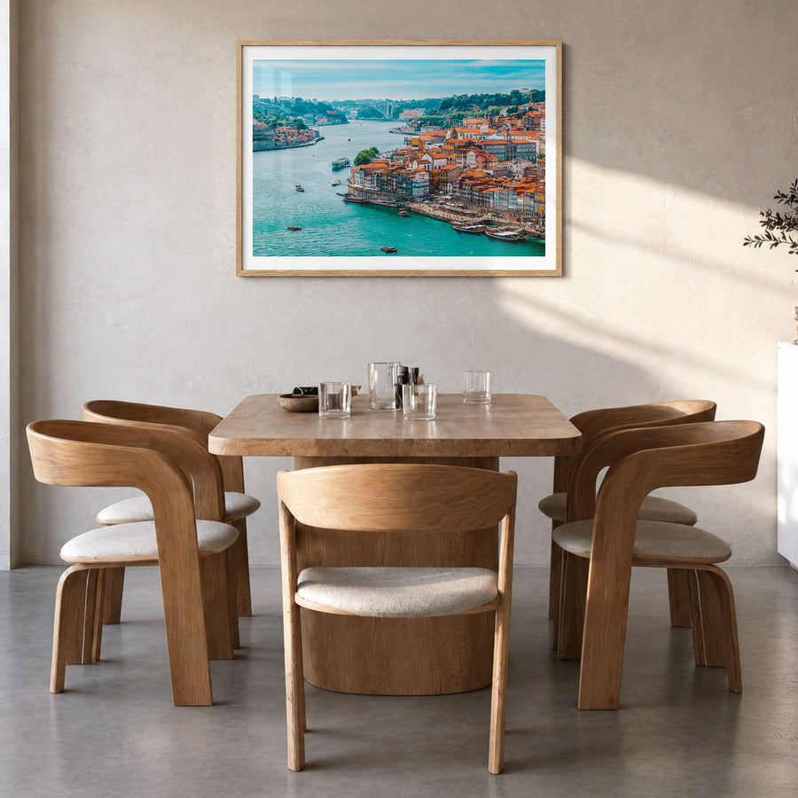 Portugal Photo Poster in a natural wood frame, hanging in a dining room, white border