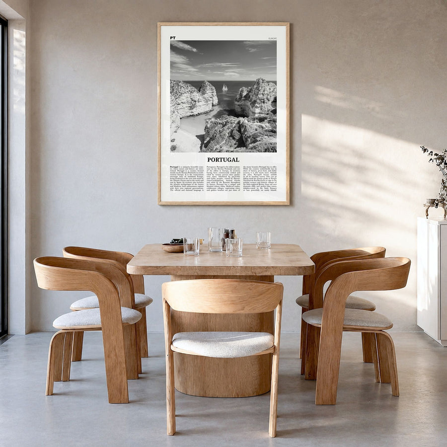 Portugal Newspaper No 3 Poster in a natural wood frame, hanging in a dining room