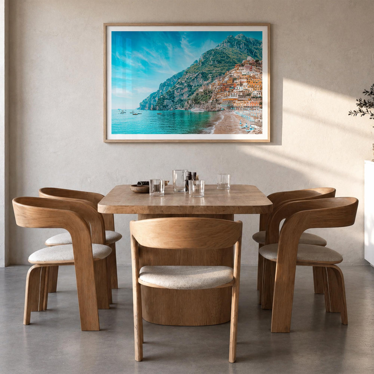 Positano colorful photo poster of Italy – horizontal wall art in natural wood frame with white border, hanging on wall