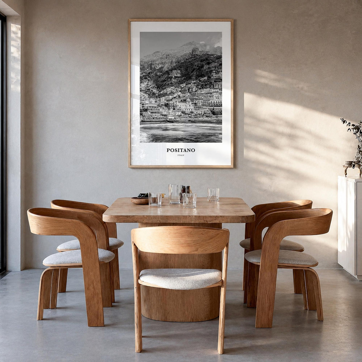 Positano no. 2 black & white classic poster of Italy – vertical wall art in natural wood frame, hanging on wall