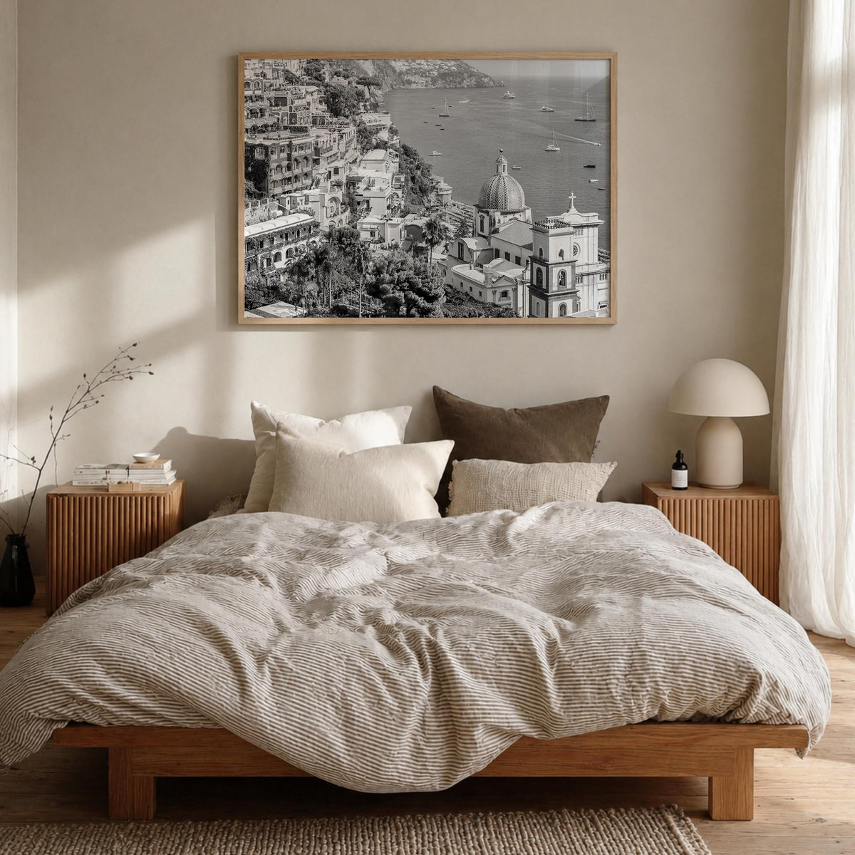 Positano no. 2 black & white photo poster of Italy – horizontal wall art in natural wood frame, hanging on wall