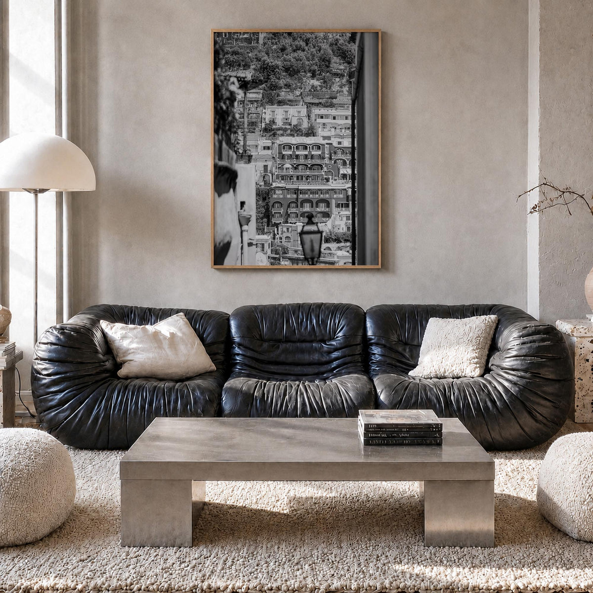 Positano no. 2 black & white photo poster of Italy – vertical wall art in natural wood frame, hanging on wall