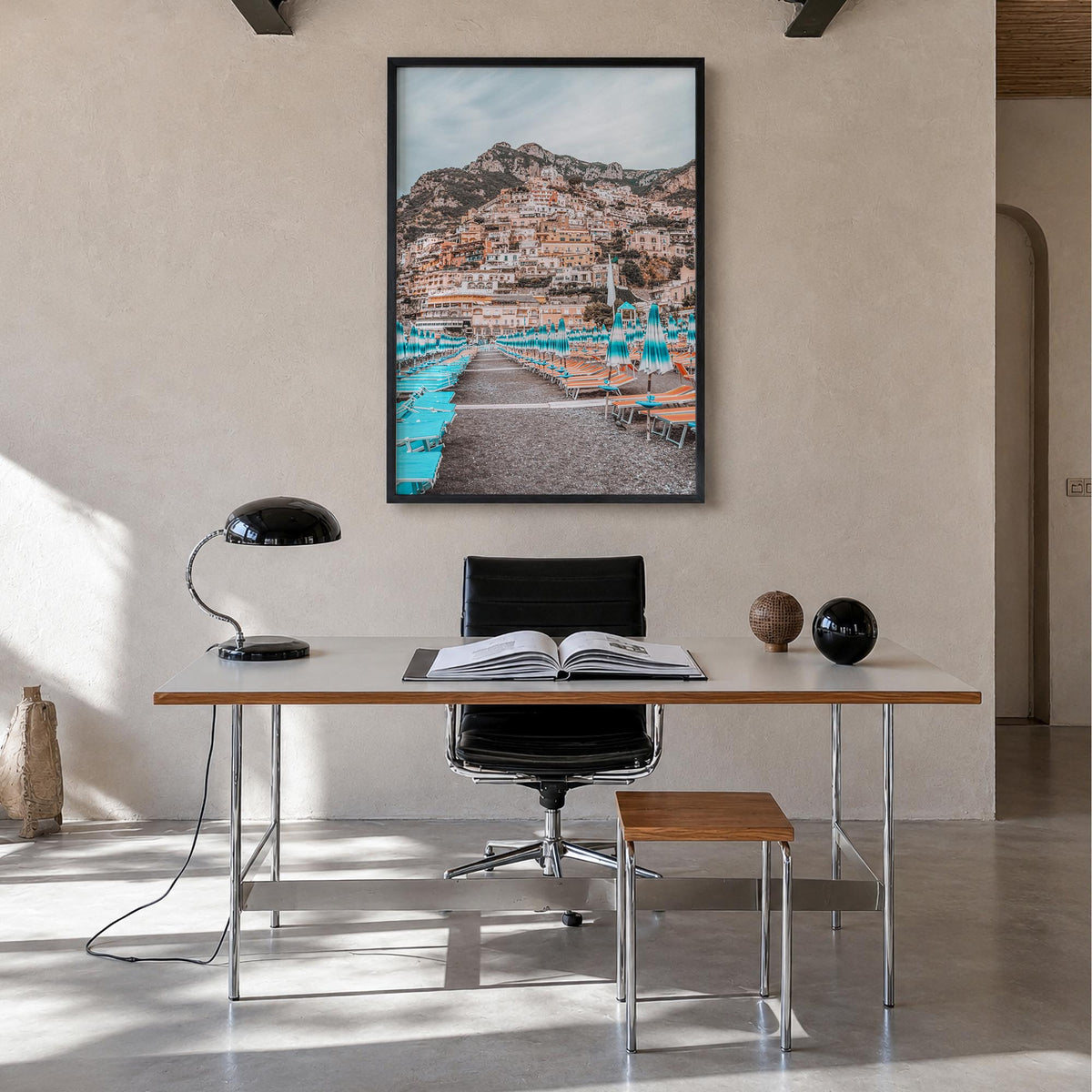 Positano no. 2 colorful photo poster of Italy – vertical wall art in black wood frame, hanging on wall