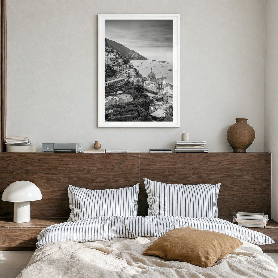 Positano Photo No 1 Poster in a white wood frame, hanging in a bedroom, white border