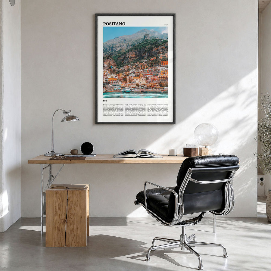 Positano Travel No 1 Poster in a black wood frame, hanging in a bright home office