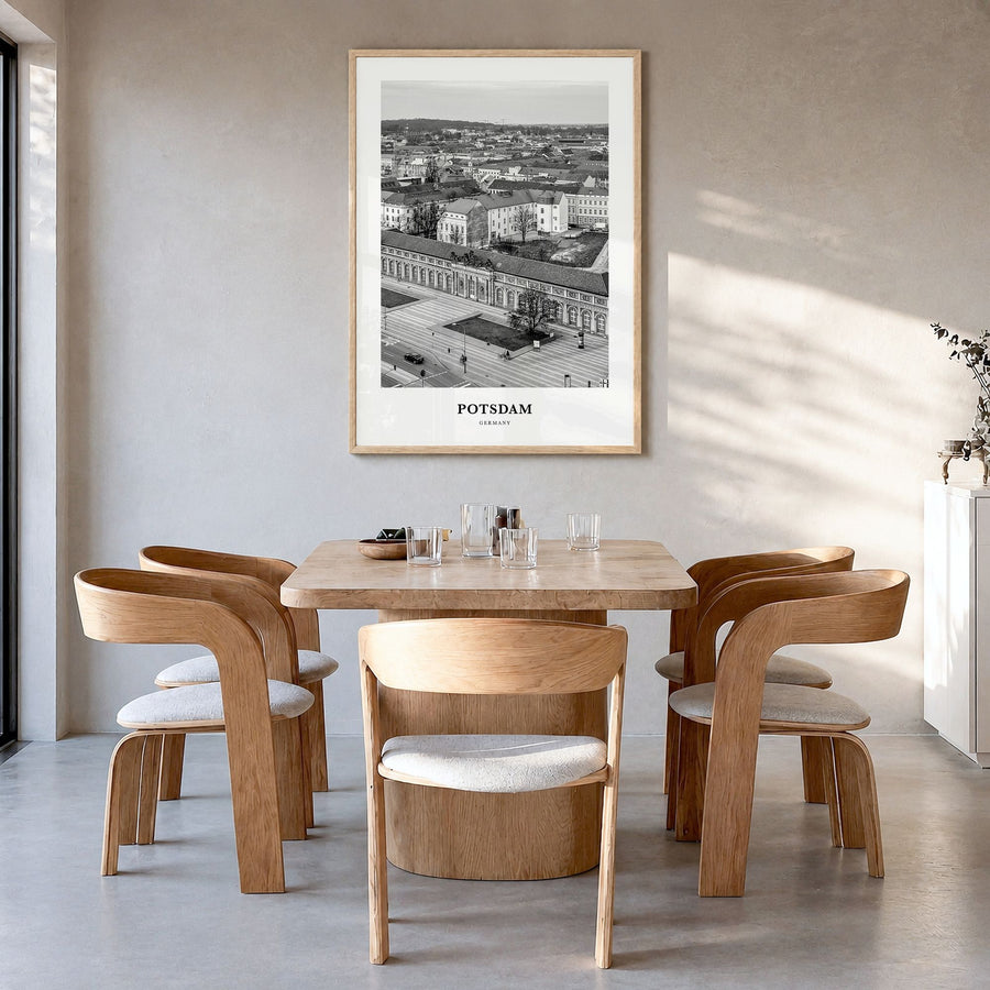 Potsdam Classic Poster in a natural wood frame, hanging in a dining room