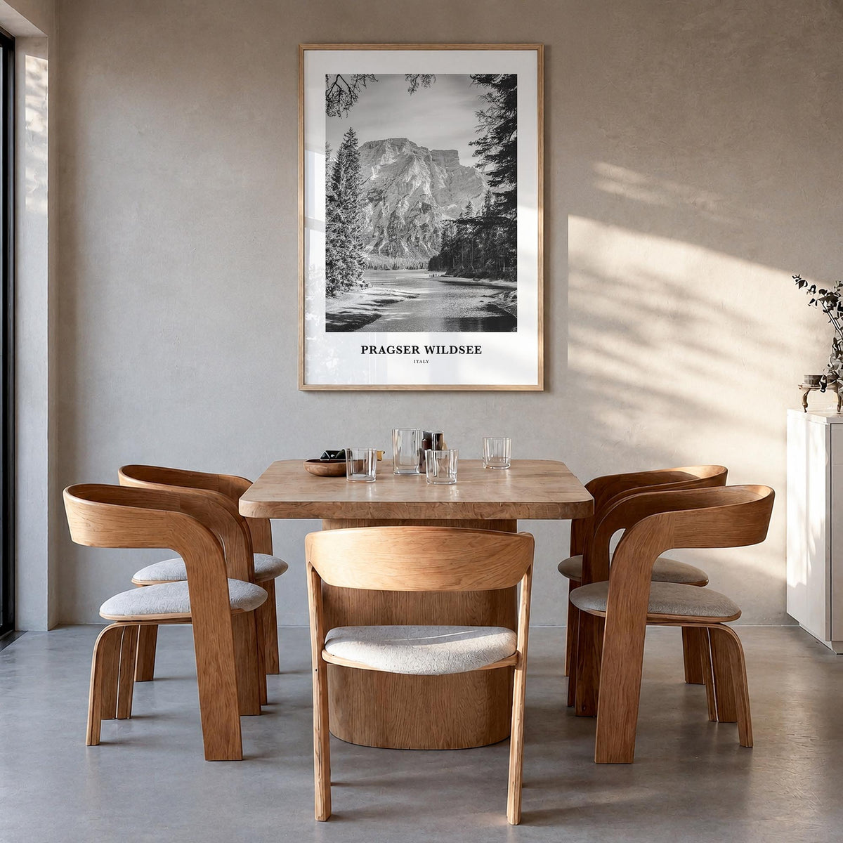 Pragser Wildsee black & white classic poster of Italy – vertical wall art in natural wood frame, hanging on wall