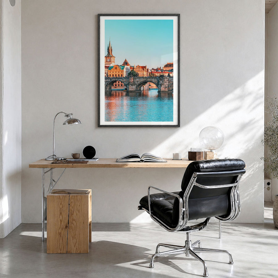Prague Photo No 1 Poster in a black wood frame, hanging in a bright home office, white border